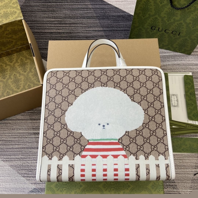 G*u*i shopping bags